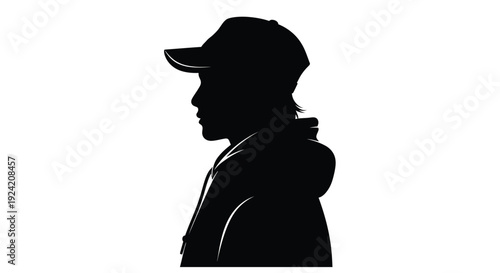 Silhouette of a man with long hair wearing a baseball cap and jacket
