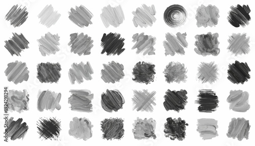 Collection of various black and white brush strokes and smudges.