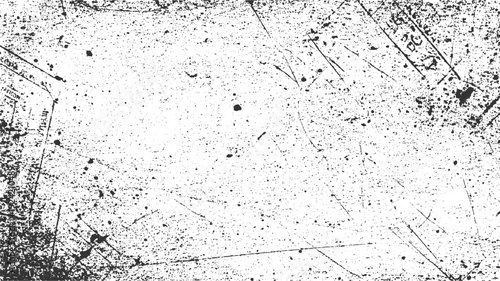 Black ink splatters and scratches on a white textured background abstract