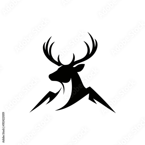 Silhouette of a majestic deer with large antlers atop stylized mountain range