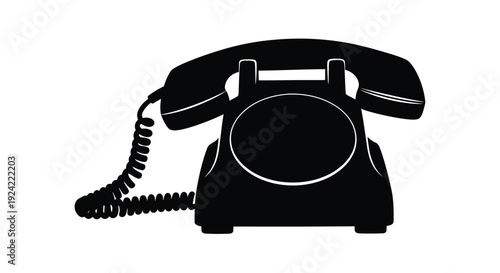 Black and white silhouette of a vintage rotary telephone on a white background