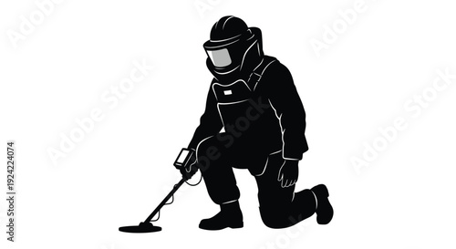 A silhouetted figure kneels using a metal detector to search