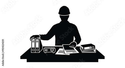 Silhouette of a construction worker at a cluttered office desk