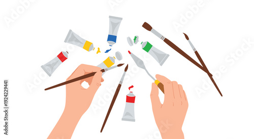 Two hands hold a paintbrush and a palette knife among several open tubes of colorful oil paint on a white surface.