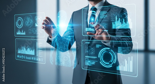 Businessman interacting with virtual data analytics interface in modern office setting with futuristic blue graphics