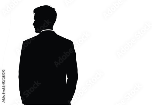 Silhouette of a man in a suit facing away from the viewer against a white background