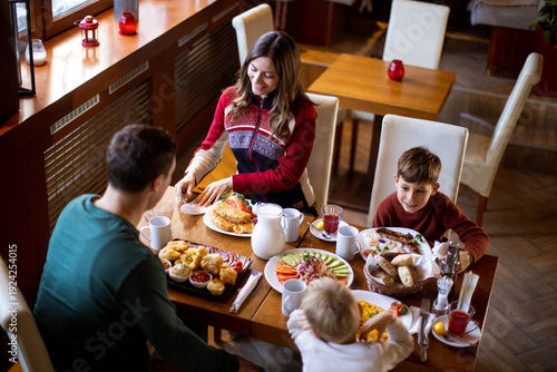 Family enjoys a meal at a r...