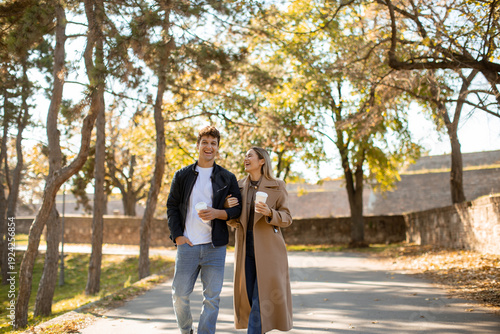 Couple walks together on a ...