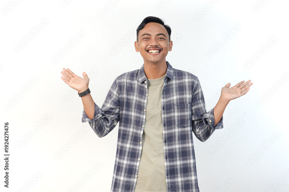 Fototapeta premium Asian man wearing a plaid shirt with a winking expression is gesturing on an isolated white background.