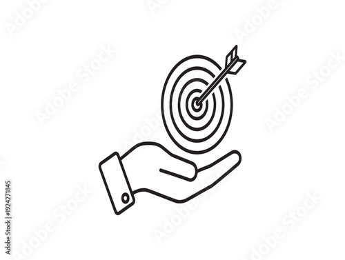 A hand holding a target with an arrow in the center