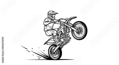 Motorcyclist performing a wheelie on a dirt bike.