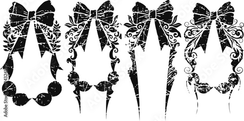 Vintage decorative bows with floral and ornamental wreath designs in black silhouettes