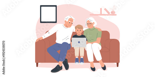 Grandparents and grandson using a laptop on a sofa