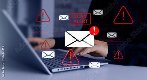 Bild auf Leinwand Businessman typing on laptop with warning email icons