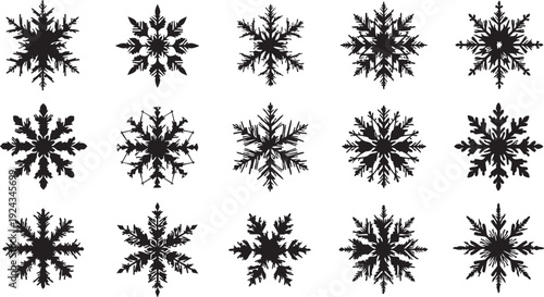 Black snowflakes on white background winter frost