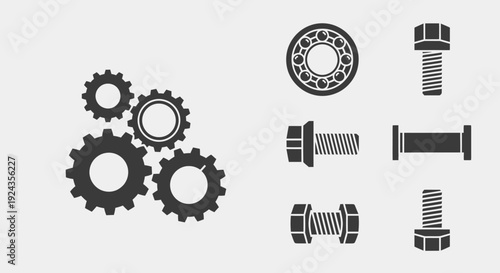 Collection of mechanical parts including gears and bolts displayed on a plain background from a straightforward viewpoint