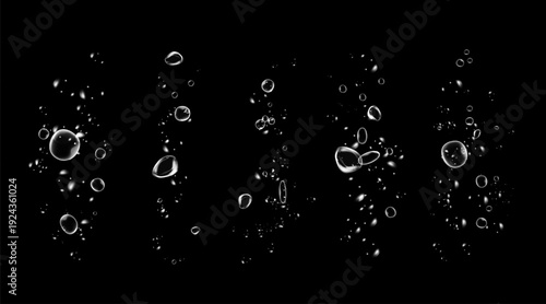 Realistic oxygen bubbles in water on a black background with fizzy sparkles and effervescent style. 