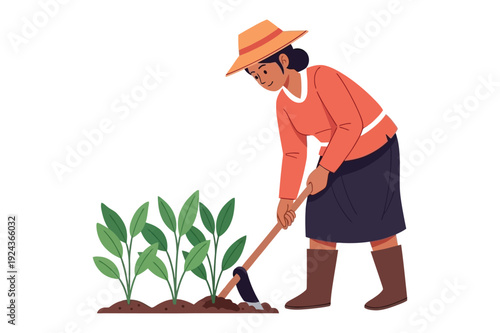 Woman farmer planting seedlings with a hoe and wearing a hat