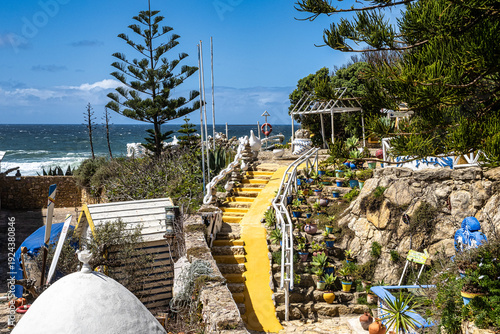 Matadouro beach in Ericeira, Portugal with beautiful touristic resorts, sandy beach and best surf conditions