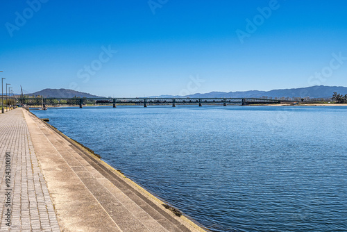 Wallpaper Mural The Gustave Eiffel Bridge over the river Lima in Viana do Castelo in Portugal. Panoramic cityscape view of Viana and the Marina. Torontodigital.ca