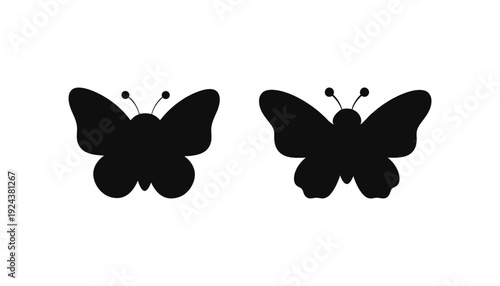 Black butterfly silhouettes on white background