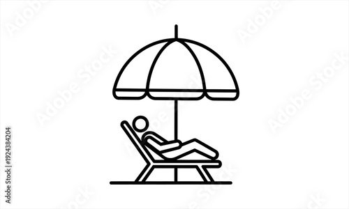 Person relaxing on a beach chair under an umbrella, enjoying leisure time.