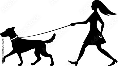 Silhouette of a woman walking a dog 