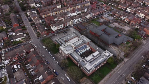 Aerial image of the Williamson Art Gallery with clear skies and well‑lit architectural details.
