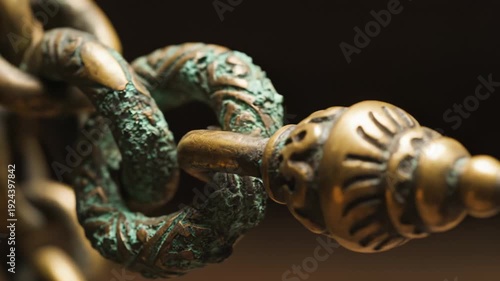 Close Up Of Tarnished Bronze Chain With Green Patina Oxidization Detail And Ornate Clasp