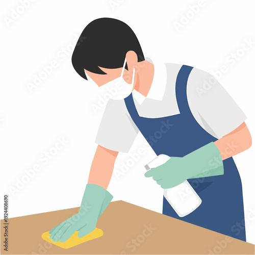 A person wearing a mask, apron, and gloves, cleaning a wooden surface with a spray bottle and sponge.
