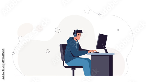 Young Man Wearing Headphones Working on Computer