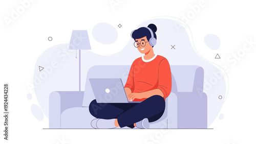 Young Woman Working Remotely on Laptop While Wearing Headphones on Sofa