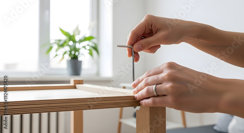 hands holding wood