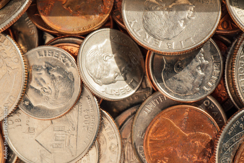Photos assorted American coins, pennies, dimes, nickels, quarters