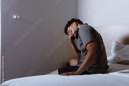 Canvas Print Man experiencing insomnia and sleeplessness feeling stressed