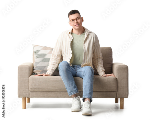 Young man in eyeglasses sit...