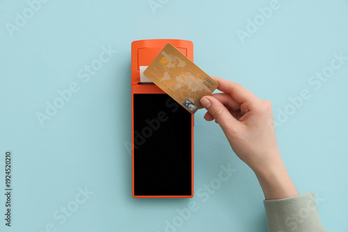 Female hand with credit car...