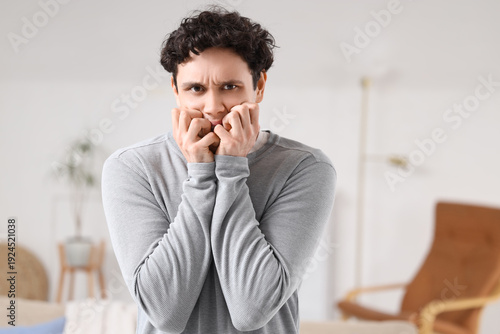 Young man having panic atta...