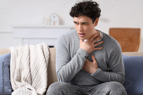 Young man having panic atta...