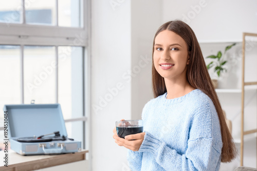 Beautiful young woman with ...