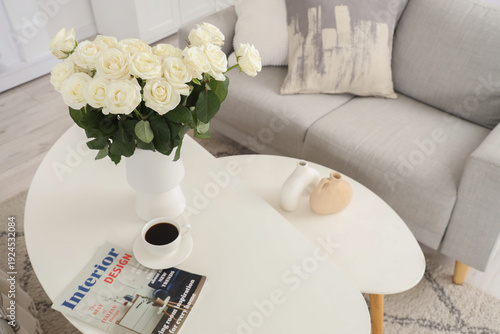Vase with white roses, coff...