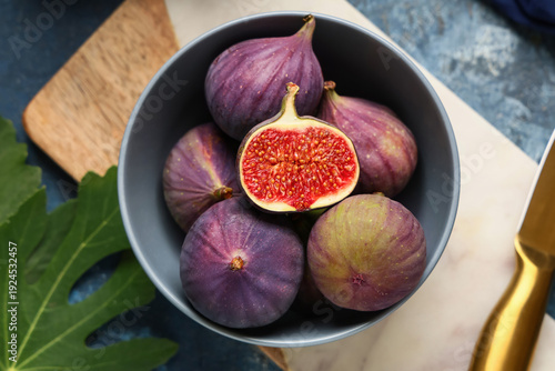 Fresh ripe purple figs in a...