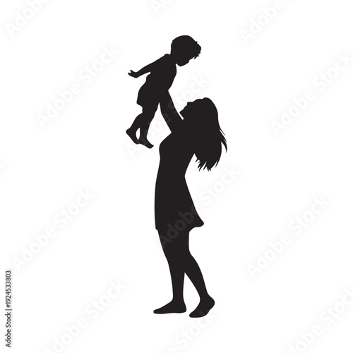 Silhouette of a mother lifting her child in the air showing love