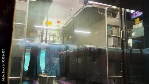 passenger train interior with foldable berths and compact cabin design