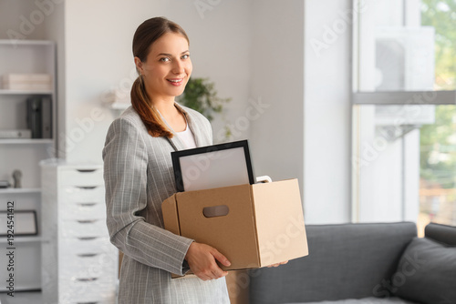 Young happy businesswoman w...
