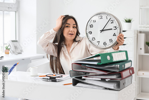 Stressed businesswoman with...