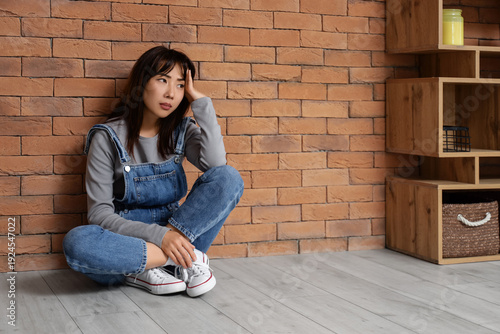 Young Asian woman with suic...