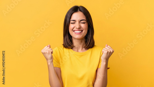 Happy Young Woman Celebrating Success Gesture.