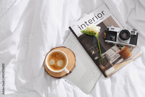 Laptop with coffee, interio...