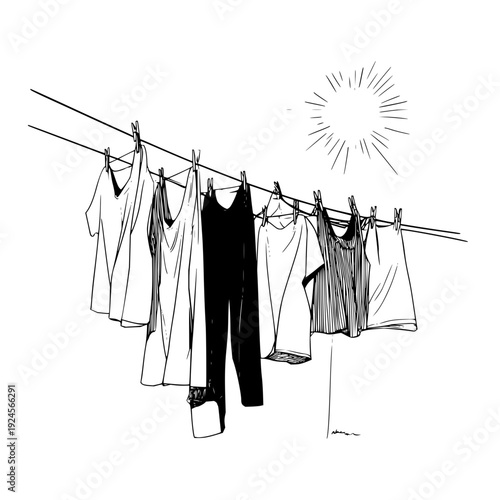 Clothes Hanging on Clothesline under Sunny Sky